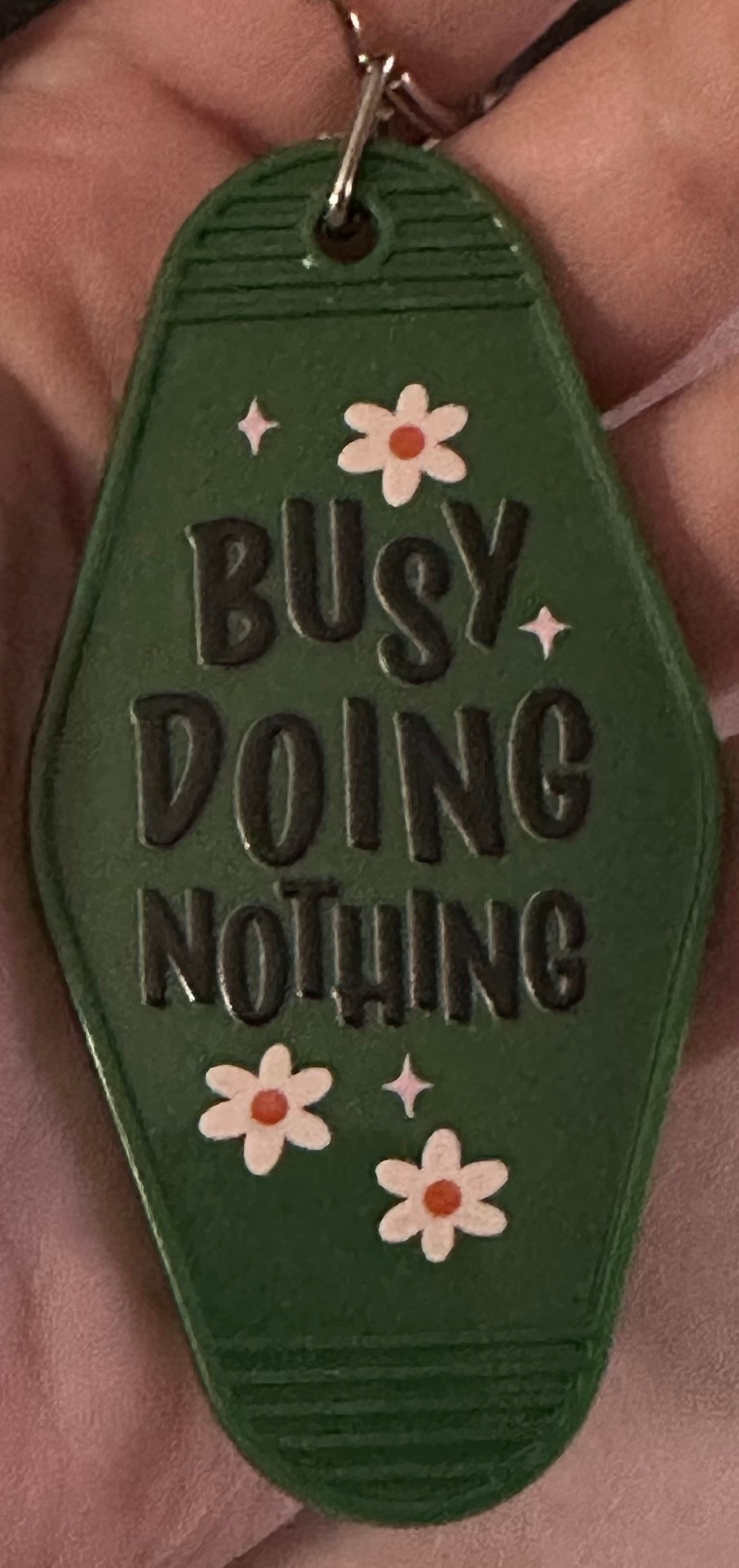Busy Doing Nothing Motel Keychain